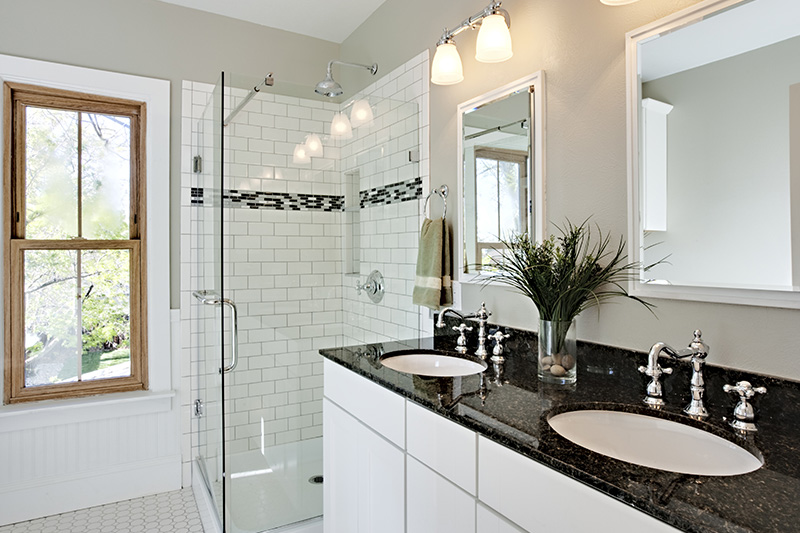 bathroom remodel with black and white tile
